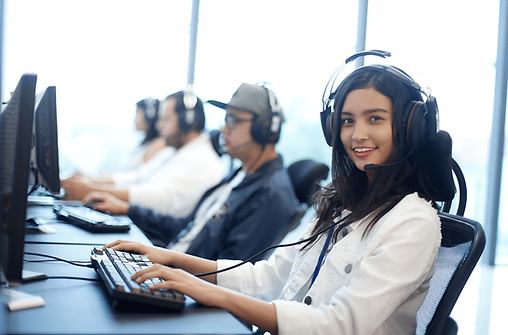 Bilingual agents working with headsets at an AC Net Center work centre
